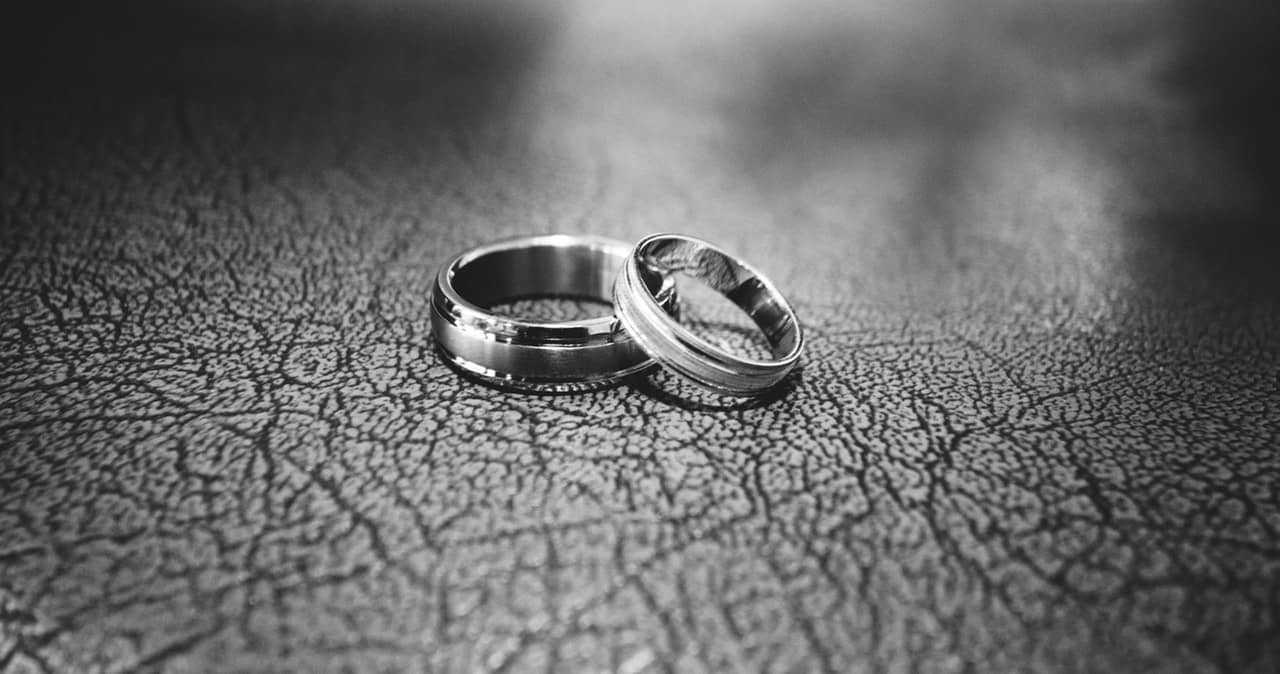 gray shot of two wedding rings